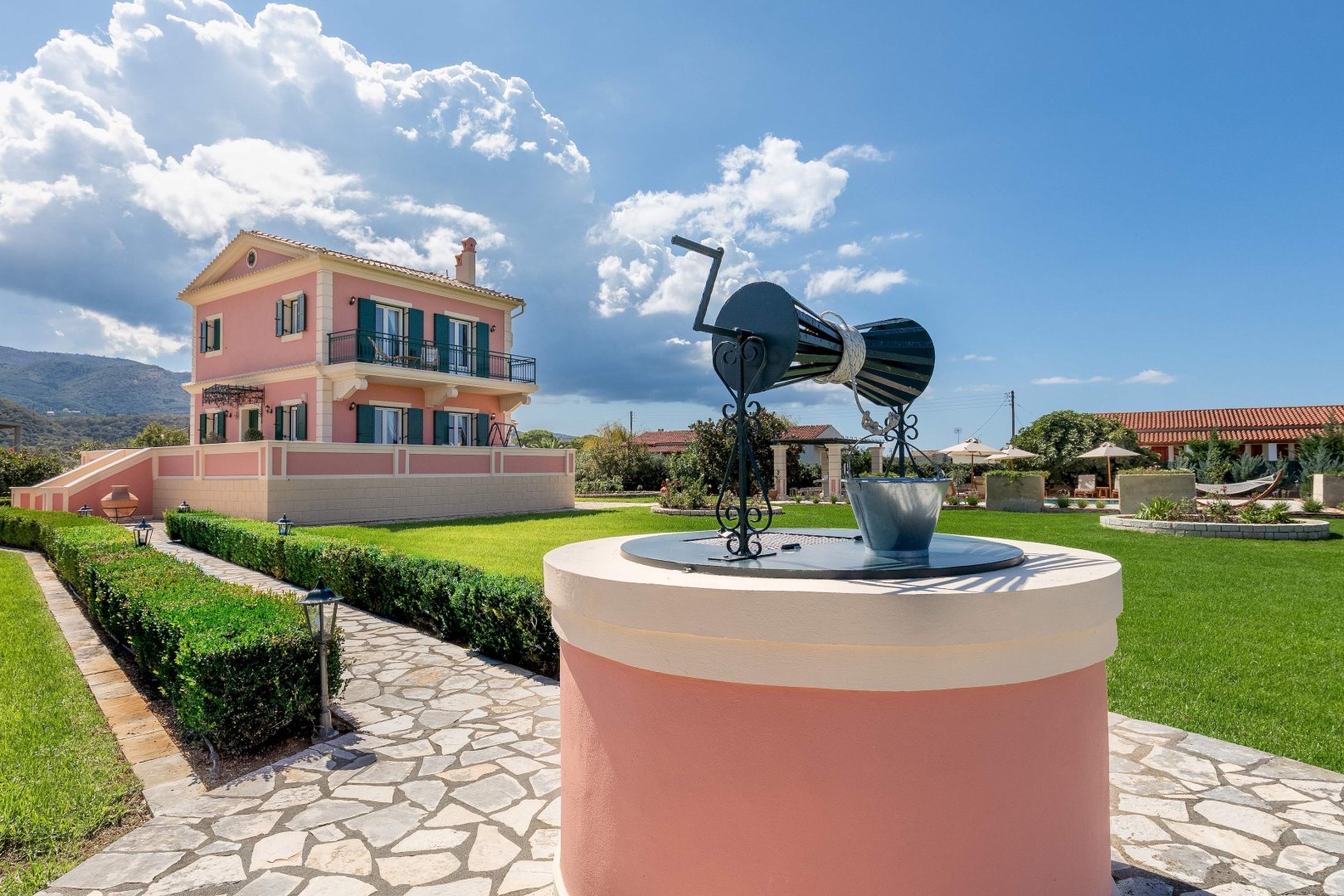 Garden sculpture and manicured lawns