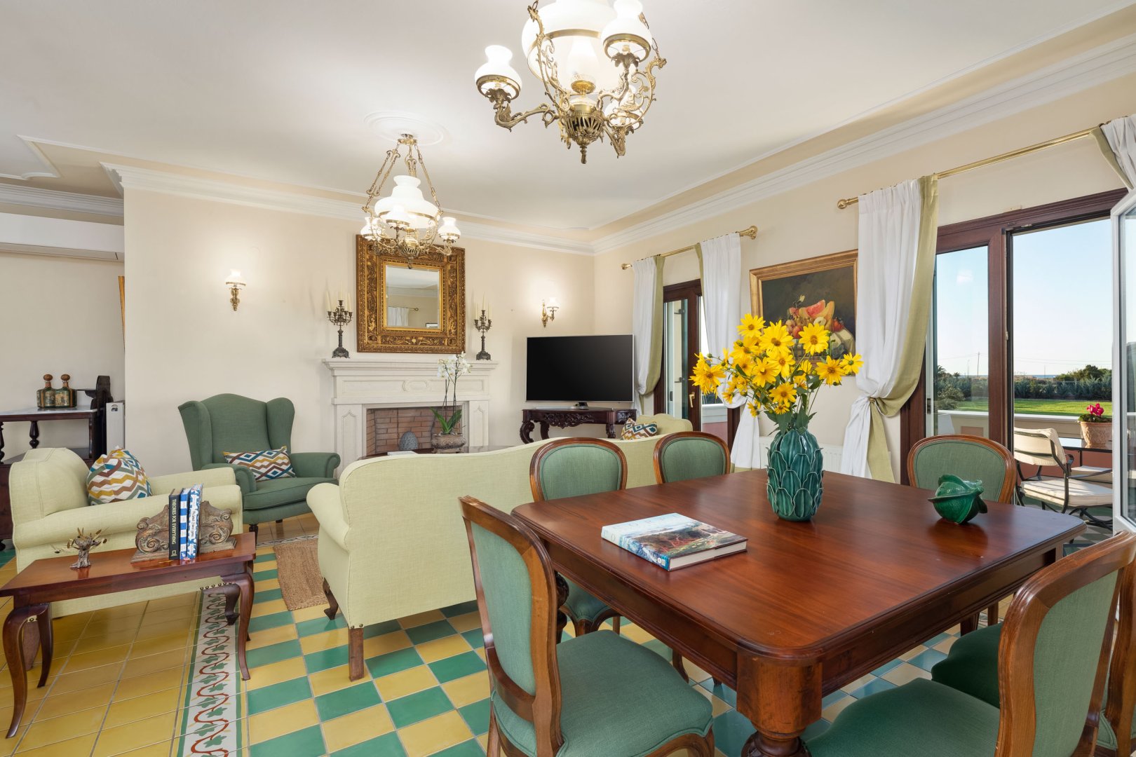 Spacious living and dining area with balcony access